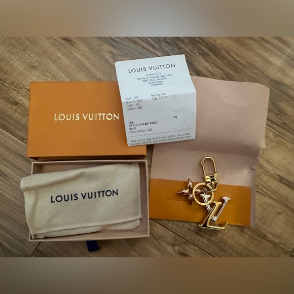Louis Vuitton key chain/ bag charm brand new never used with receipt! - Picture 2 of 5